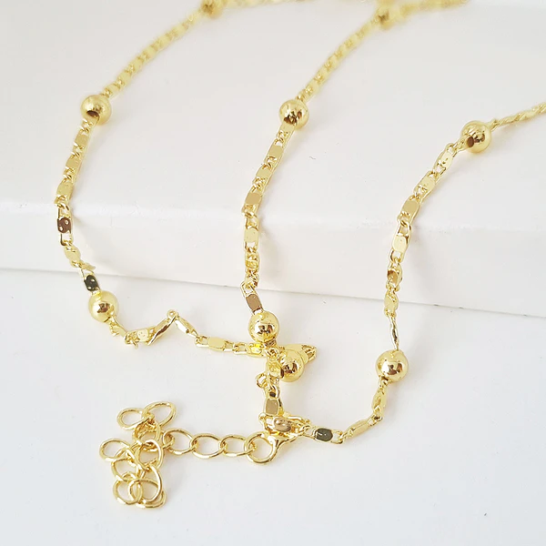 collar bolitas doradas