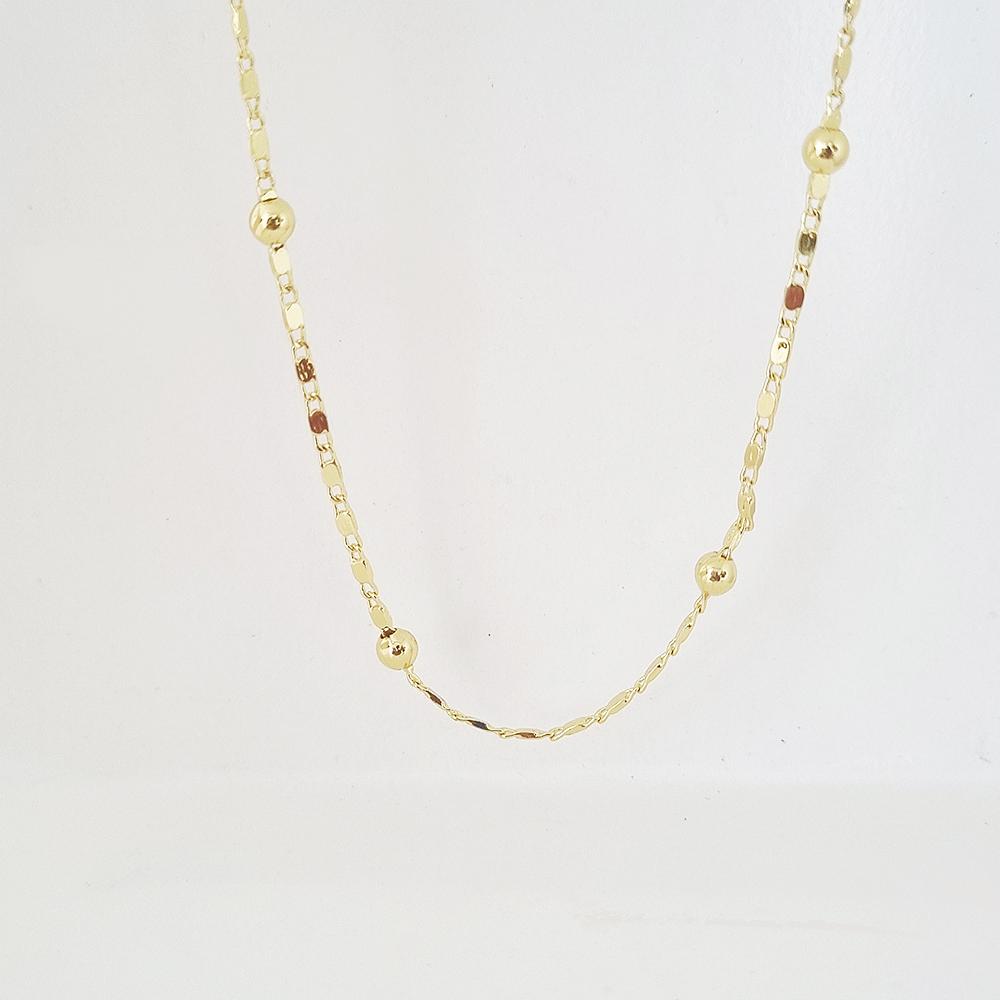 collar bolitas doradas
