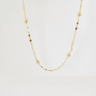 collar bolitas doradas
