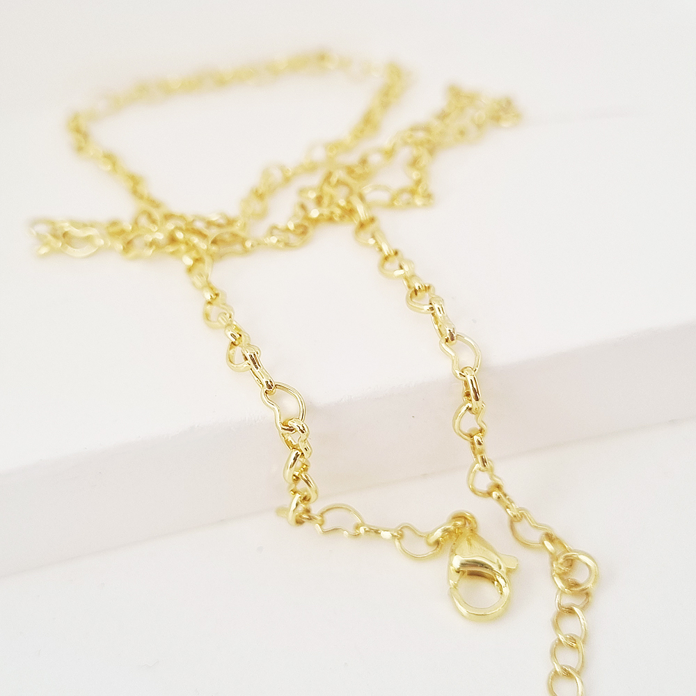 collar corazones dorado