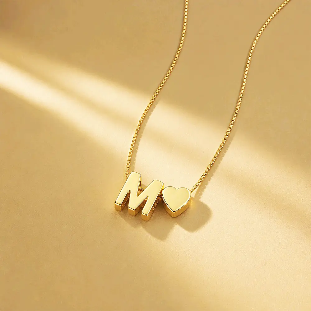 DIJE CORAZON SOLITAIRE DORADO
