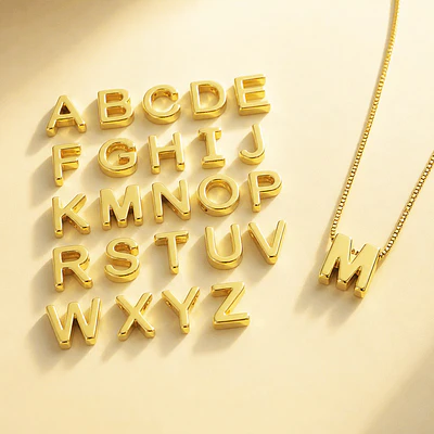 GRATIS TU LETRA✨CADENA IKONICA LAGRIMA BRILLANTE