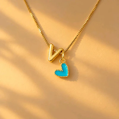 CADENA 1LETRA DORADA Y CORAZON JOLIE TURQUESA