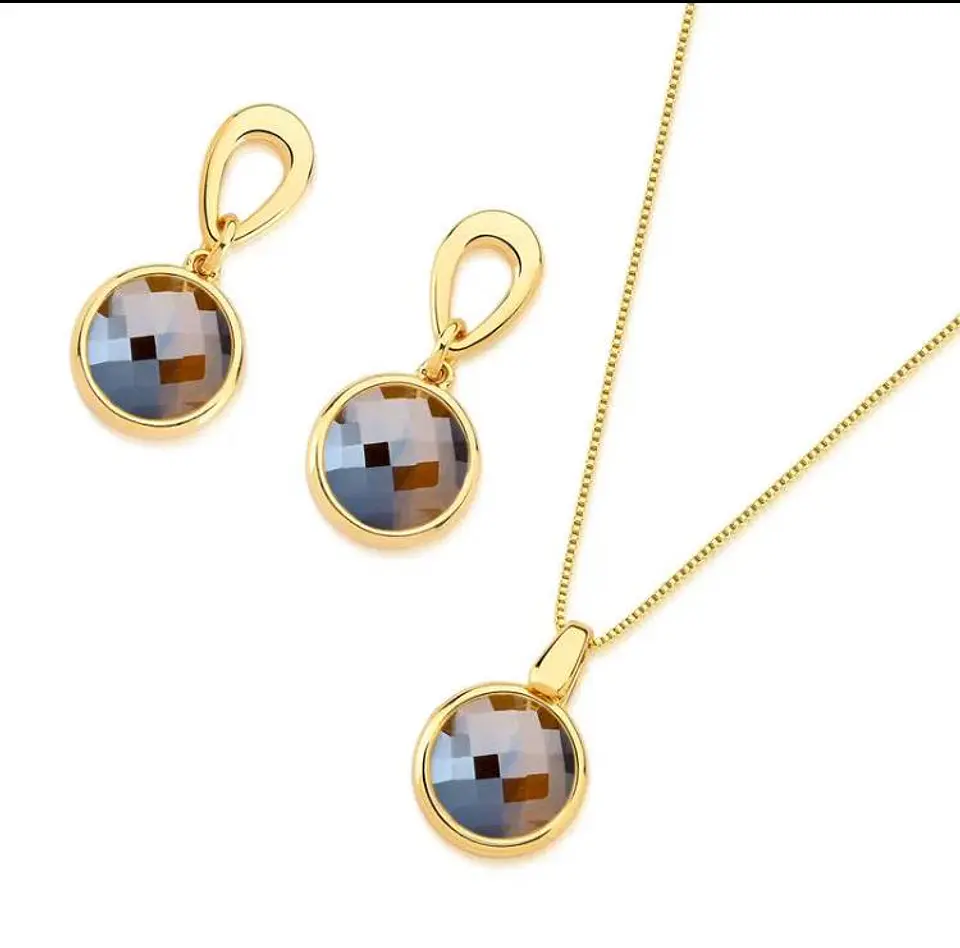 Conjunto baño de oro 18k con piedra cuarzo ahumado facetada . 2