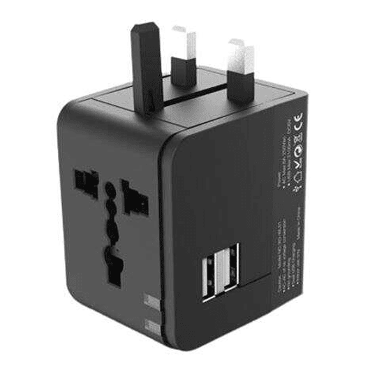 XO Adaptador de Viaje Universal - Voltaje 110V-240V - 2 Puertos USB 2.1Amp - Conexiones para UK, EU, AU, US - Color Negro