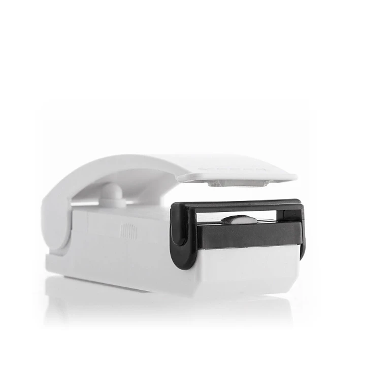 Innovagoods Selladora de Bolsas con Iman - Sellado Hermetico - Prolonga la Conservacion de Alimentos - Funciona con Pilas - Portatil - 9.5x4x4cm - Col 1