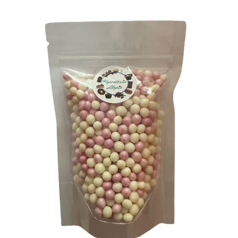 Bolitas De Cereal Blanco Rosado Bañadas En Chocolate 80g