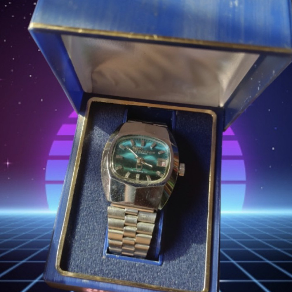 Jean Marttan acero esfera turquesa nuevo sin uso.