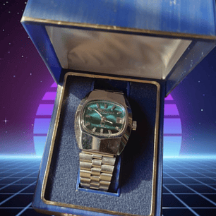 Jean Marttan acero esfera turquesa nuevo sin uso.