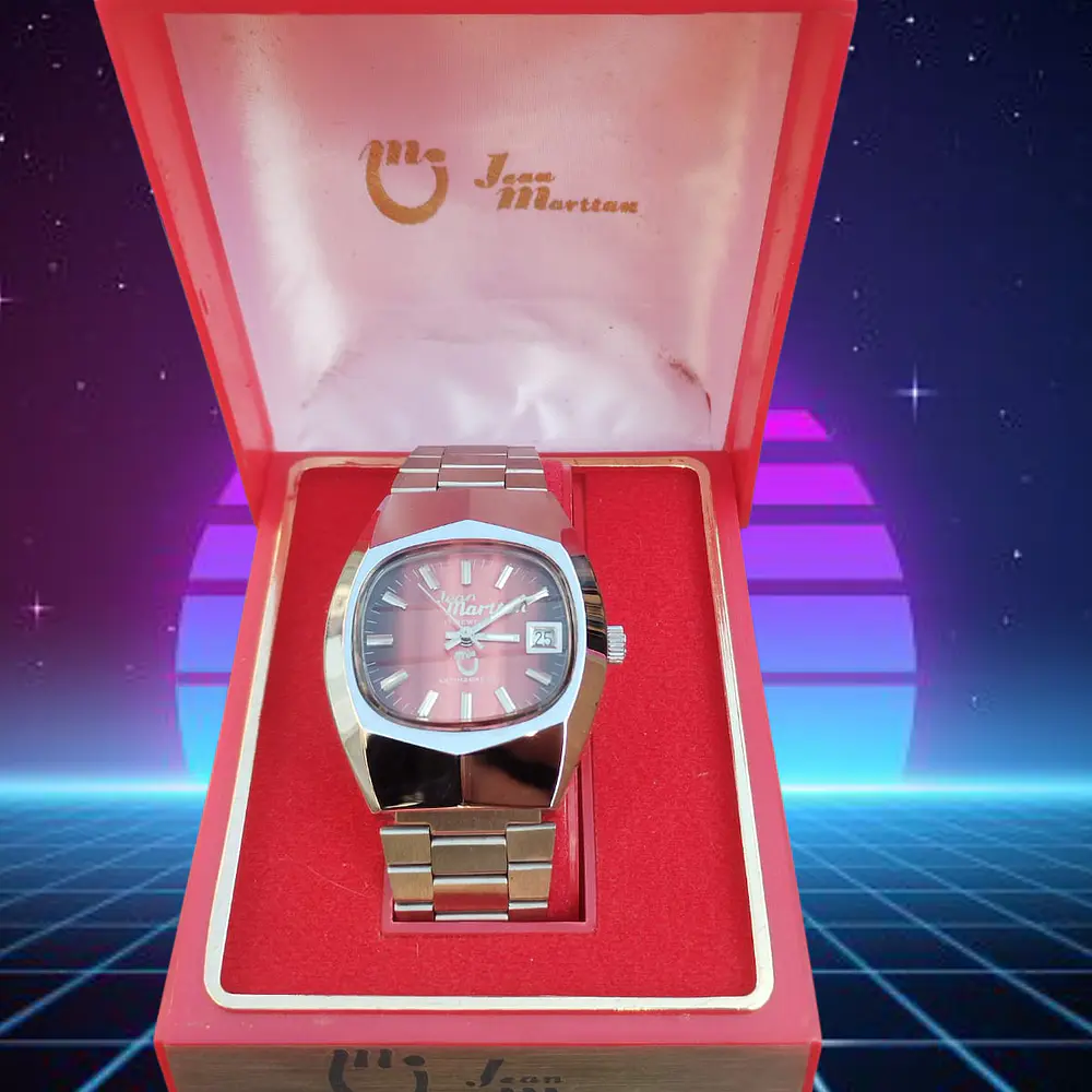 Reloj Jean Marttan acero esfera color rojo sandia Nuevo sin uso ochentero con su caja original. 1