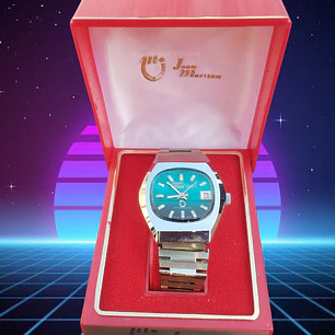 Reloj Jean Marttan acero esfera turquesa nuevo sin uso.