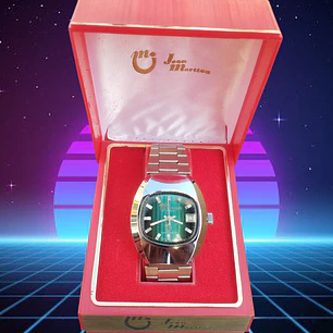 Reloj Jean Marttan acero esfera color Mostaza Nuevo sin uso ochentero con su caja original.