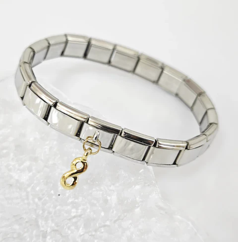 PULSEIRA ELASTICA DE AÇO NOMI-1236