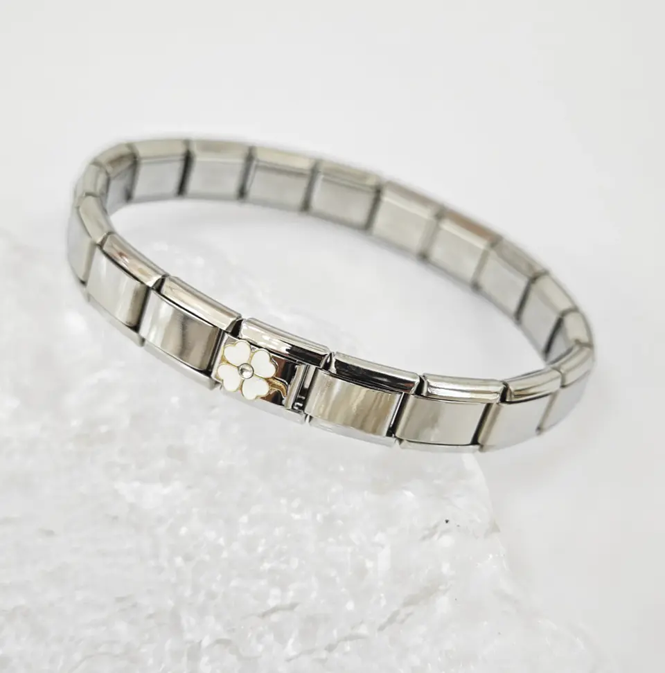 PULSEIRA ELASTICA DE AÇO NOMI-1217 1