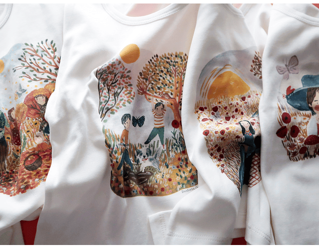 Polera blanca manga larga ilustrada estampada