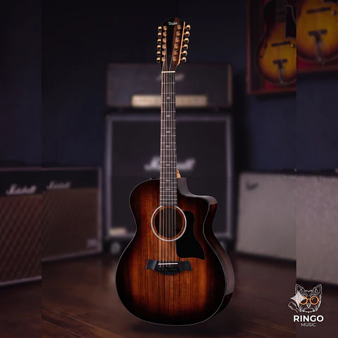 Guitarra electroacústica TAYLOR Deluxe con tapa de koa hawaiana