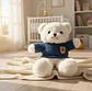 Oso De Peluche Blanco Con Chaleco Azul Tejido 23 Cm  - Miniatura 1