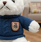 Oso De Peluche Blanco Con Chaleco Azul Tejido 23 Cm  - Miniatura 3