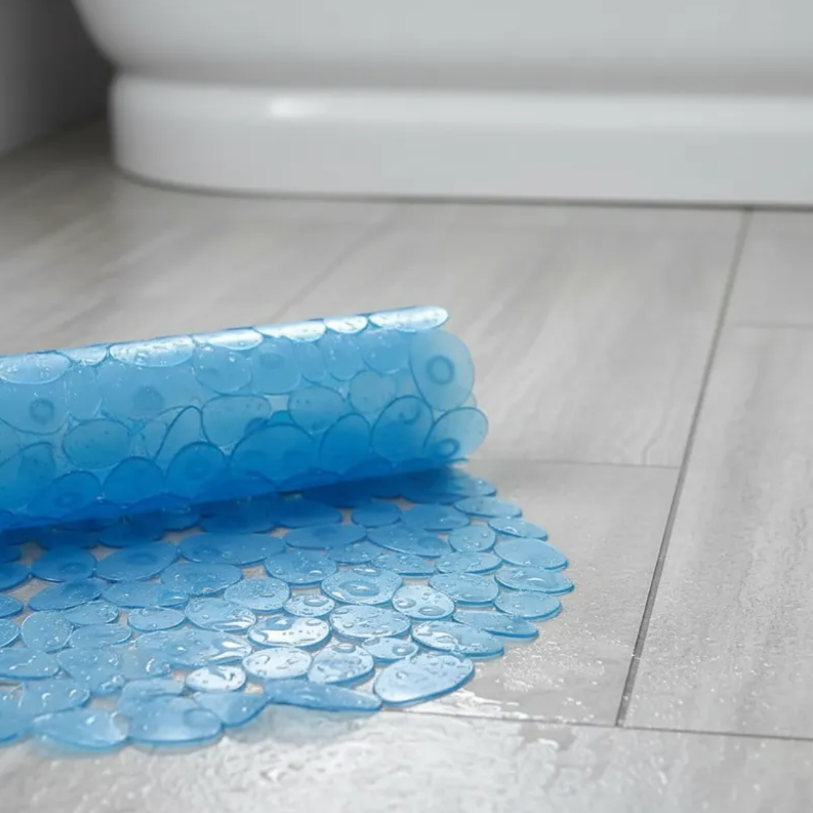 Alfombra antideslizante para baño 65x35 cm con ventosas 7