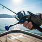 Carrete De Pesca Spinning MA6000 Metálico Negro Y Azul - Miniatura 4