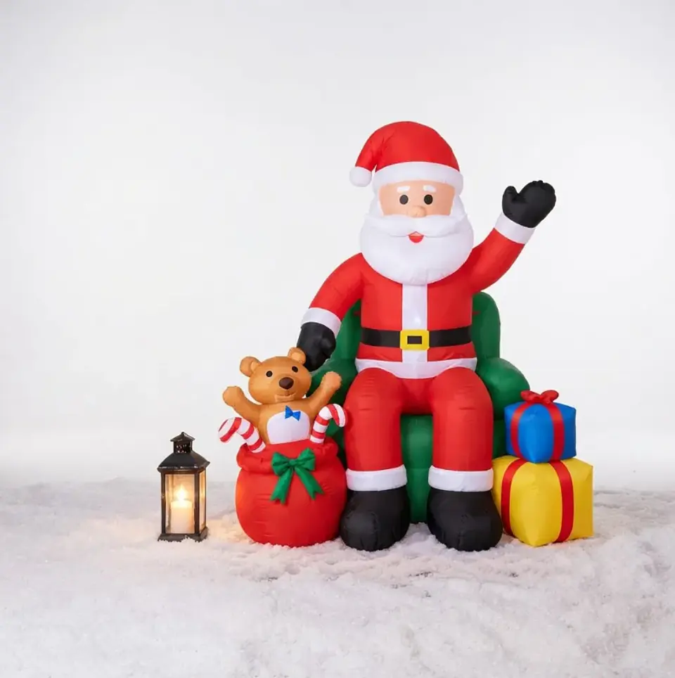 Papá Noel sentado en sillón inflable eléctrico con luces 240cm 1