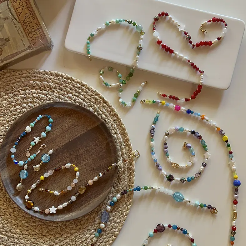 collares mix piedras/perlas de rio