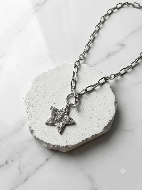 collar estrella acero