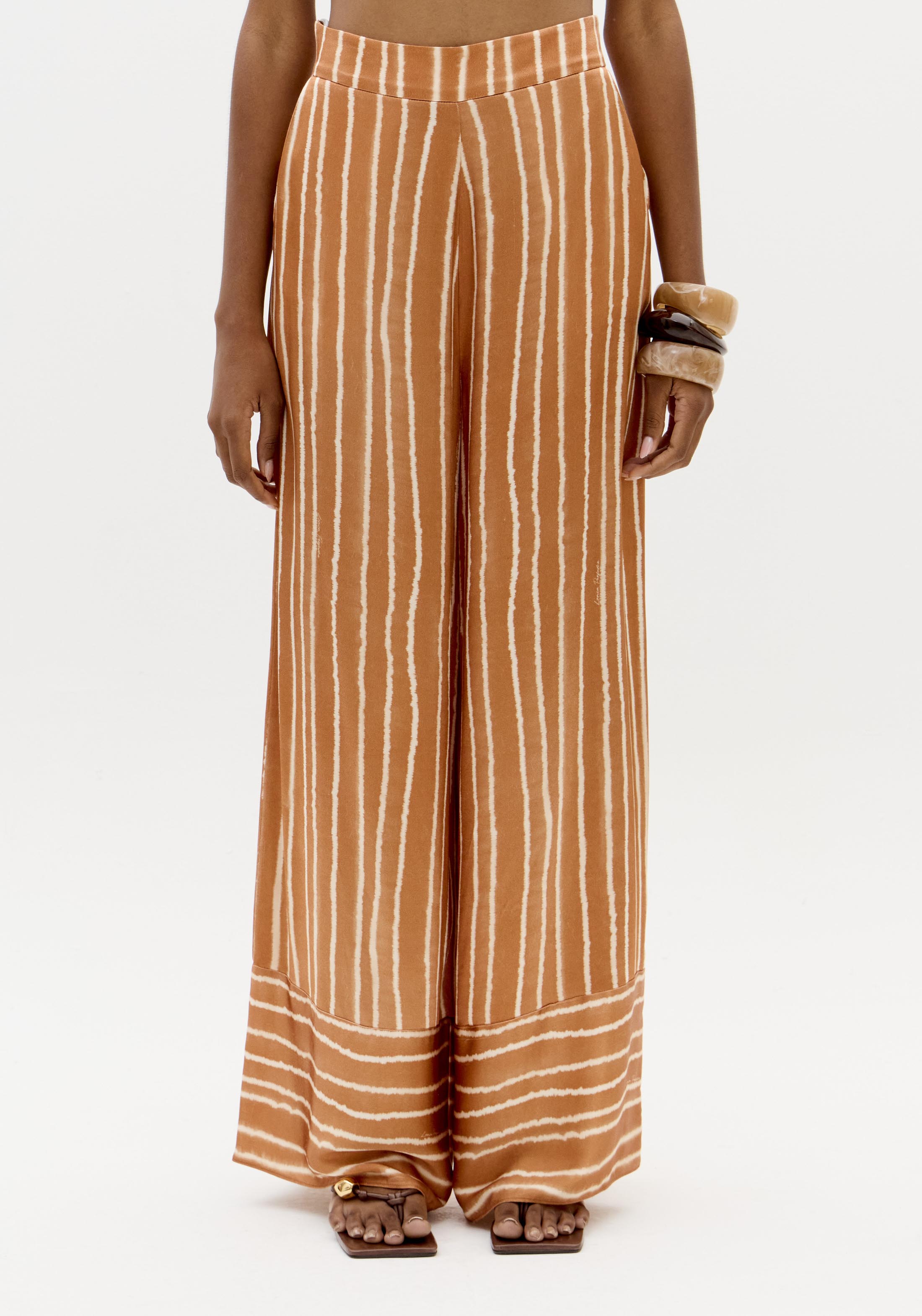 Calças Largas com Riscas Laranja - Lança Perfume 1