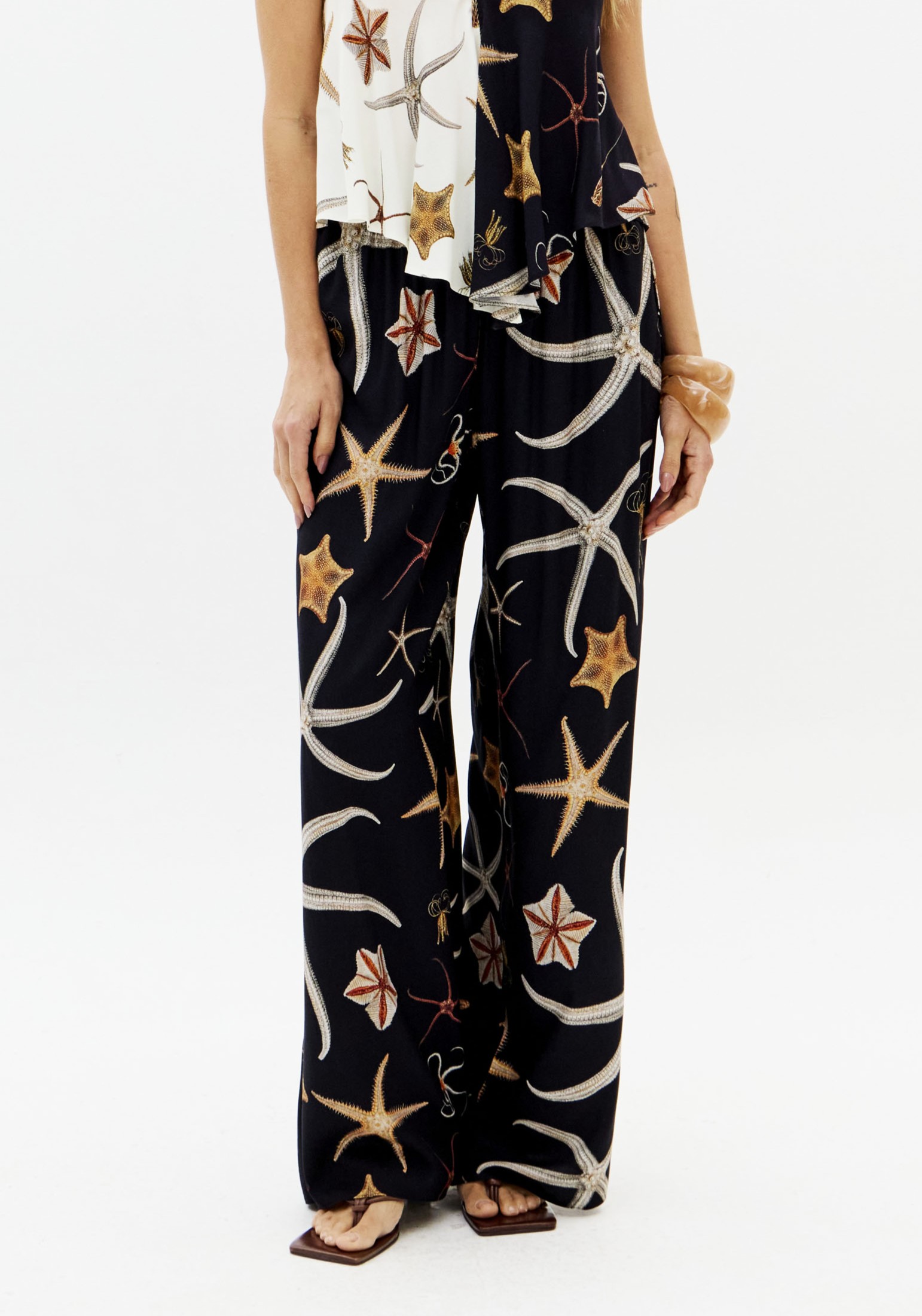 Calças Largas STARFISH Preto - Lança Perfume 1