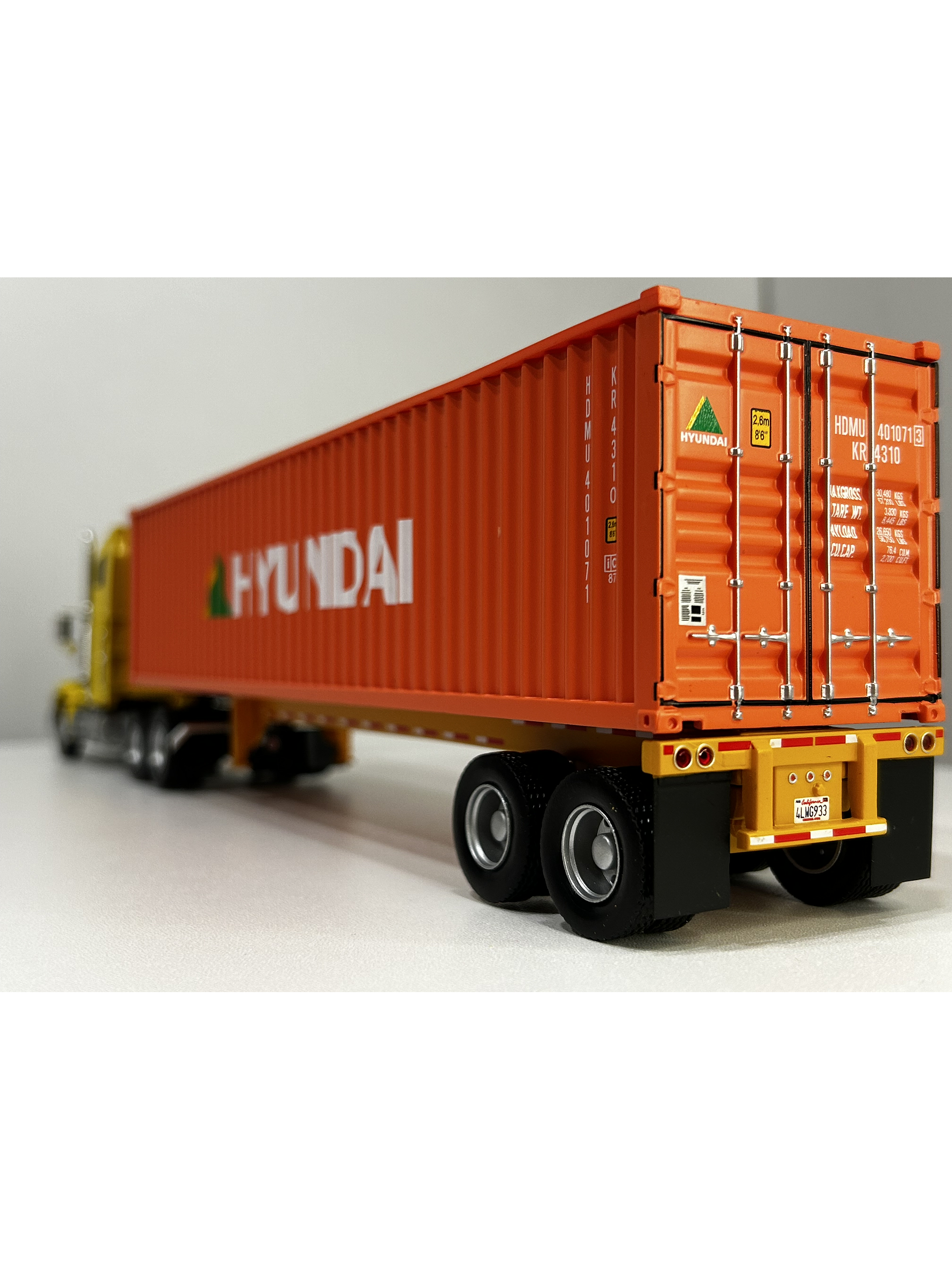Camión Freightliner FLD 112 (1993) con Contenedor Hyundai – Escala 1:43. Colección Camiones Americanos 11