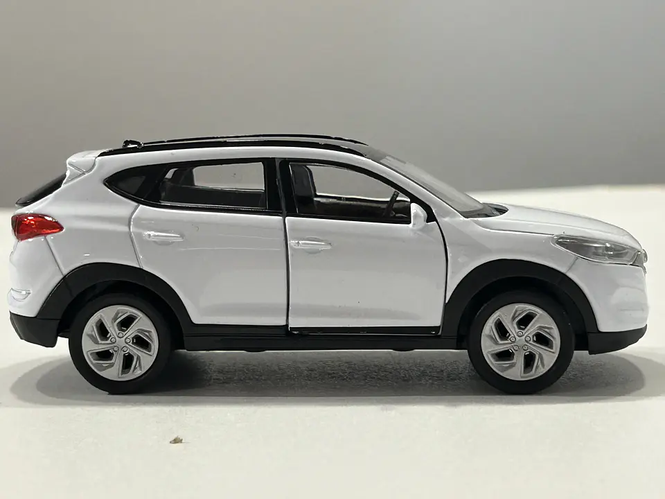 Auto Hyundai Tucson SUV | Welly 1:32 Coleccionable 5