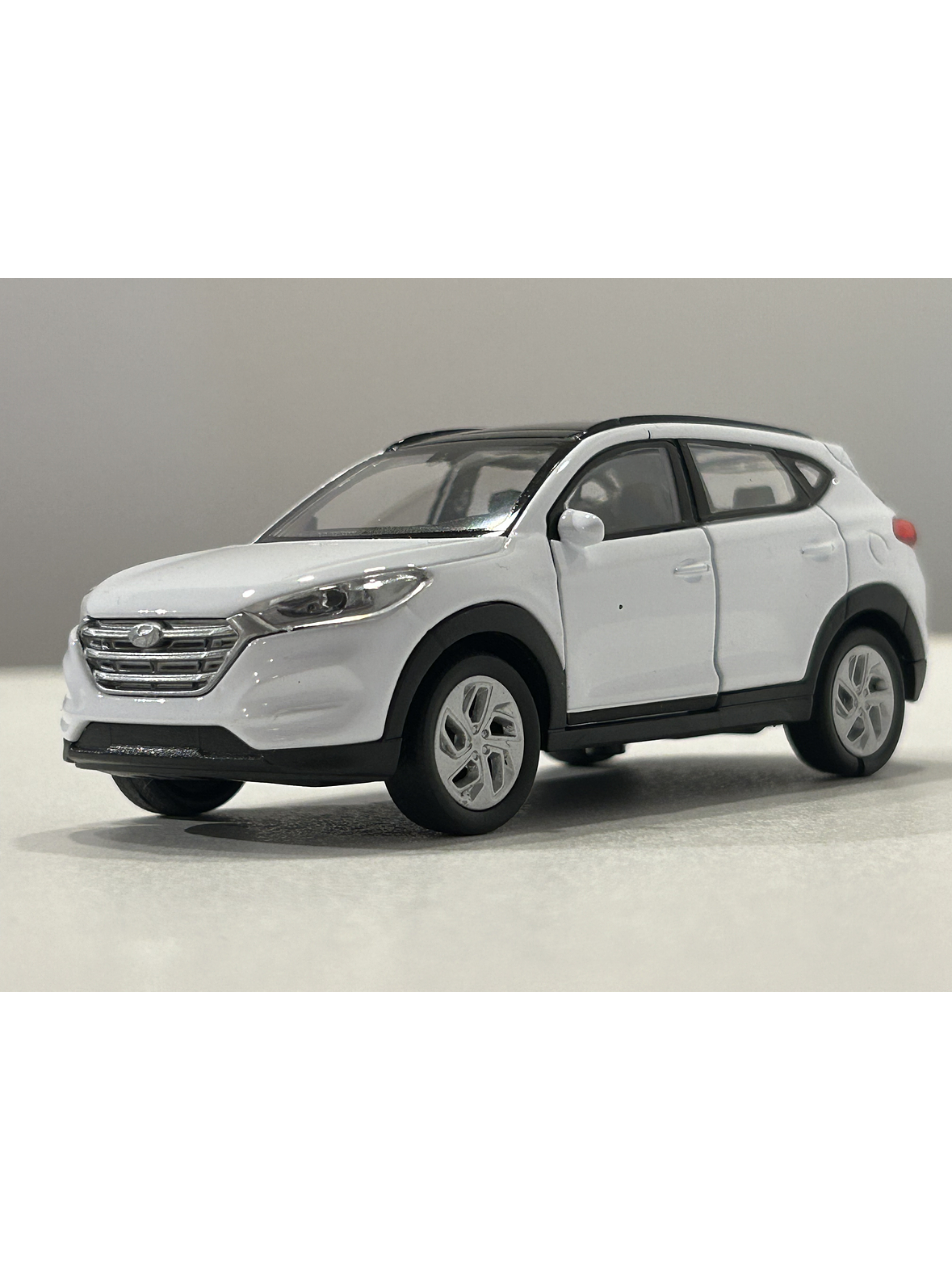 Hyundai Tucson SUV – Modelo a Escala Welly 1:32 | Detalle Realista y Coleccionismo Automotriz 2