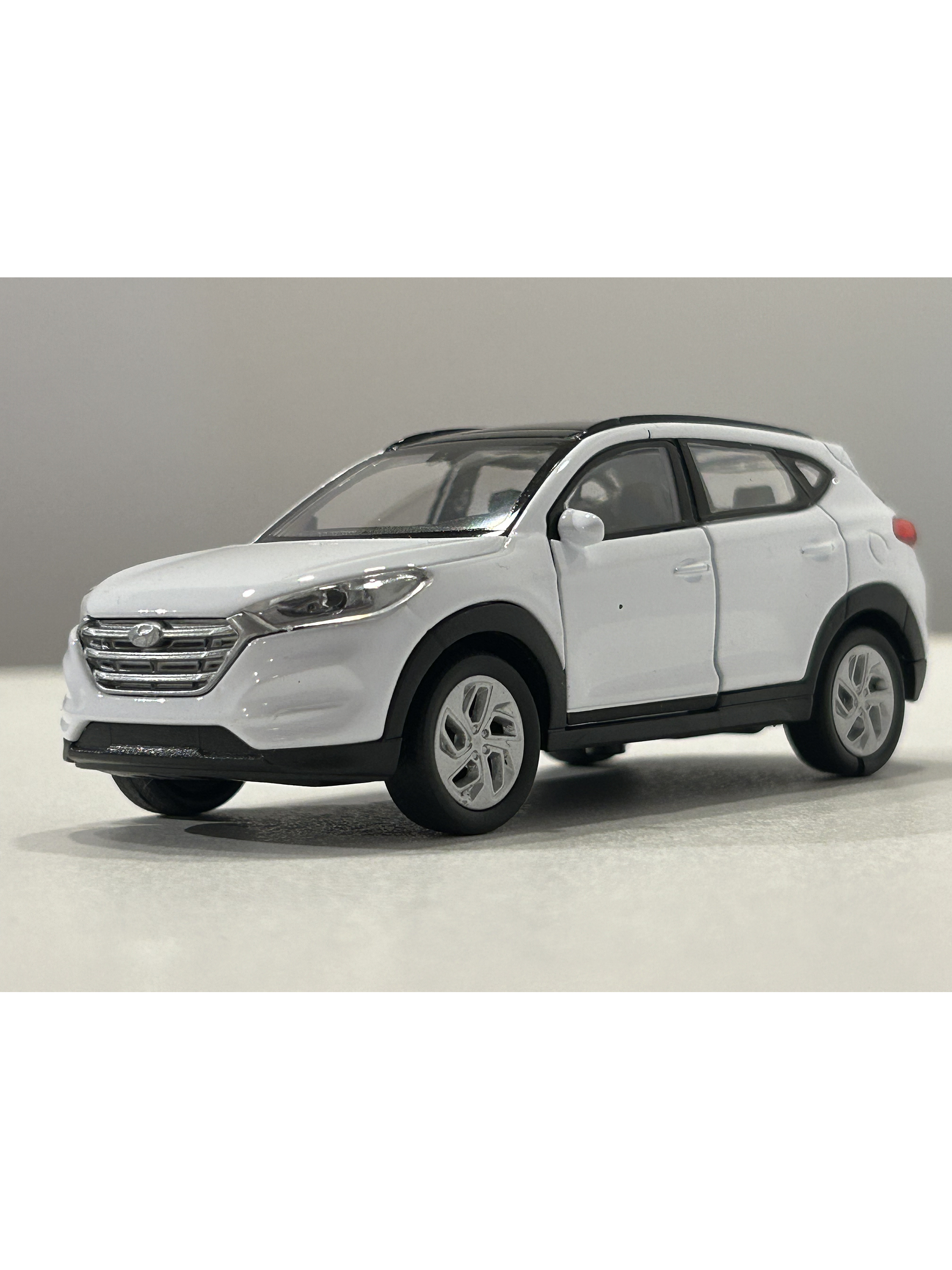 Hyundai Tucson SUV – Modelo a Escala Welly 1:32 | Detalle Realista y Coleccionismo Automotriz 2