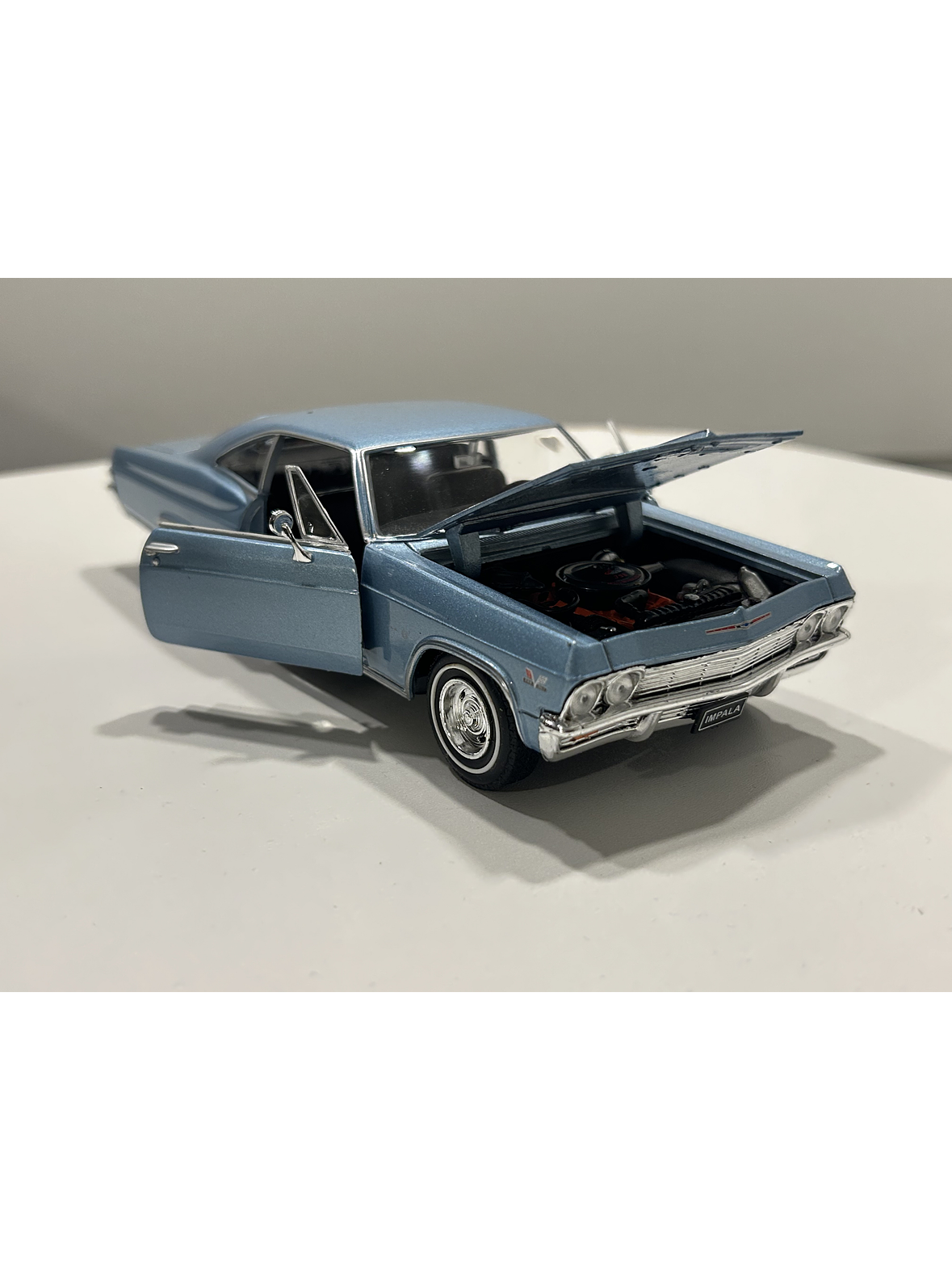 Chevrolet Impala SS 396 1965 – Modelo a Escala 1:24 Welly Diecast Coleccionable 4