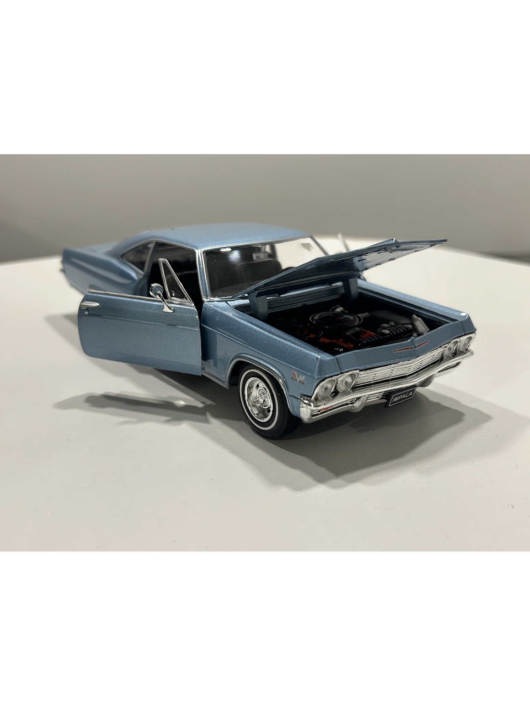 Chevrolet Impala SS 396 1965 – Modelo a Escala 1:24 Welly Diecast Coleccionable 4