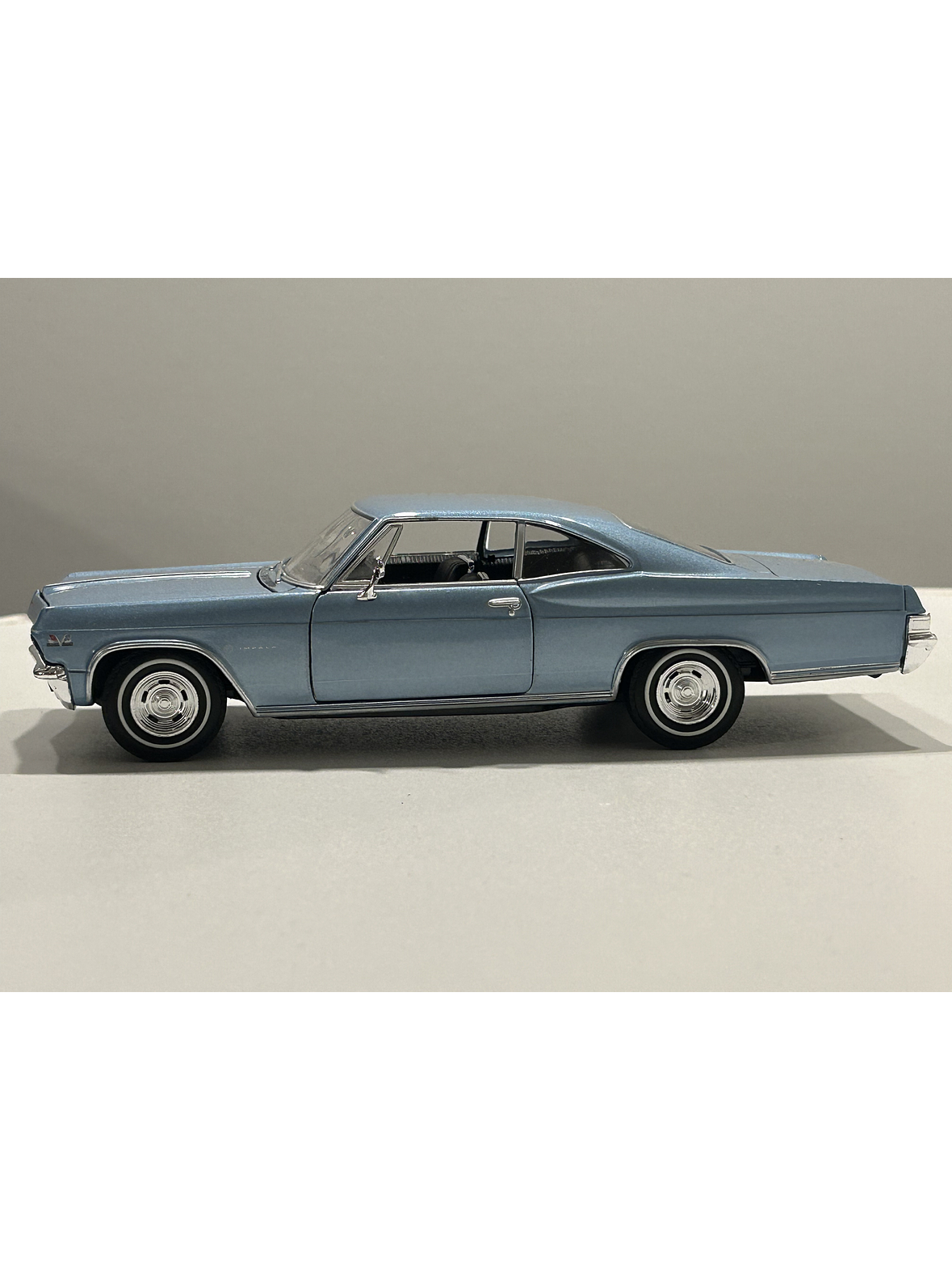 Chevrolet Impala SS 396 1965 – Modelo a Escala 1:24 Welly Diecast Coleccionable 10