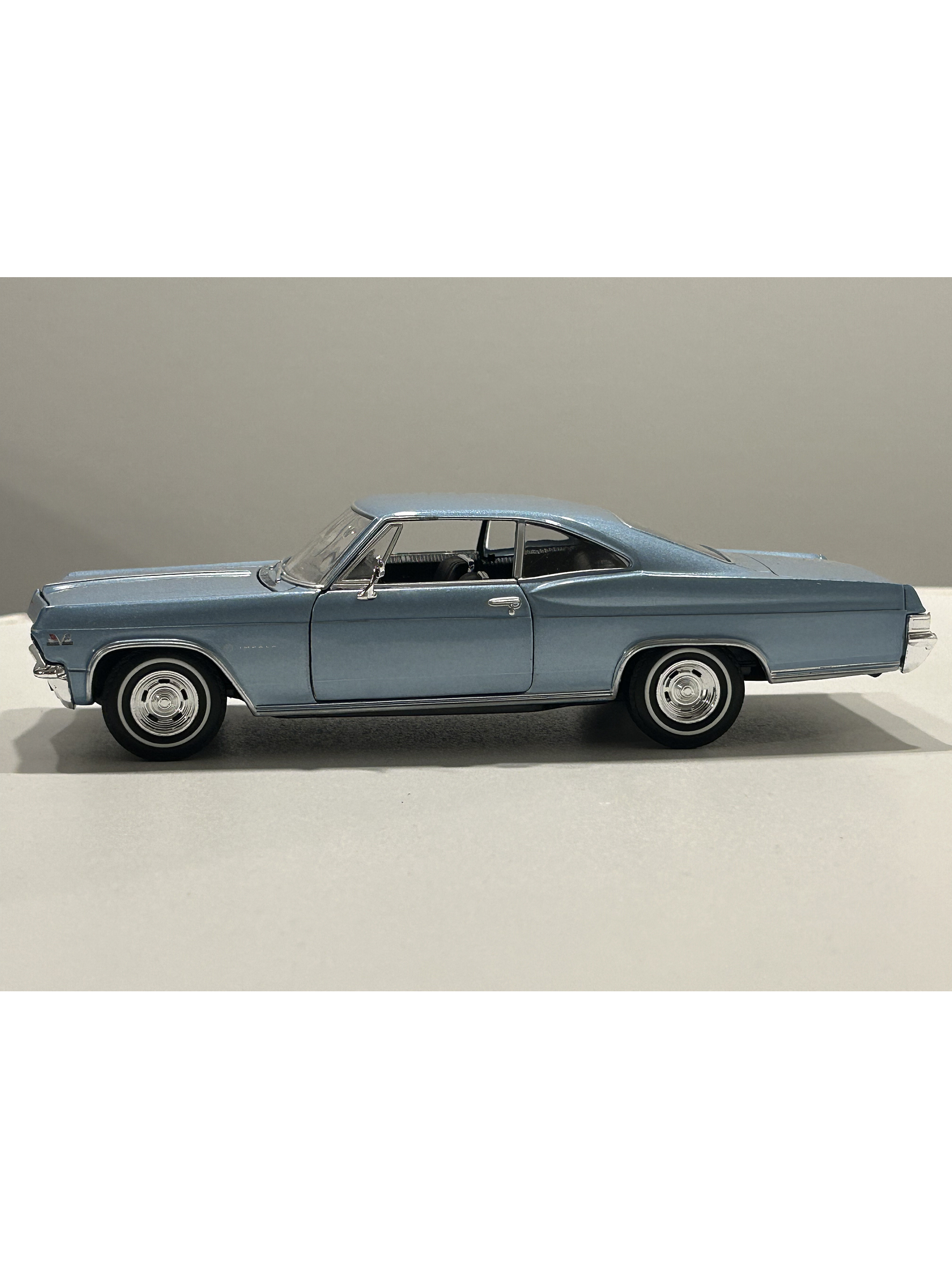 Chevrolet Impala SS 396 1965 – Modelo a Escala 1:24 Welly Diecast Coleccionable 10