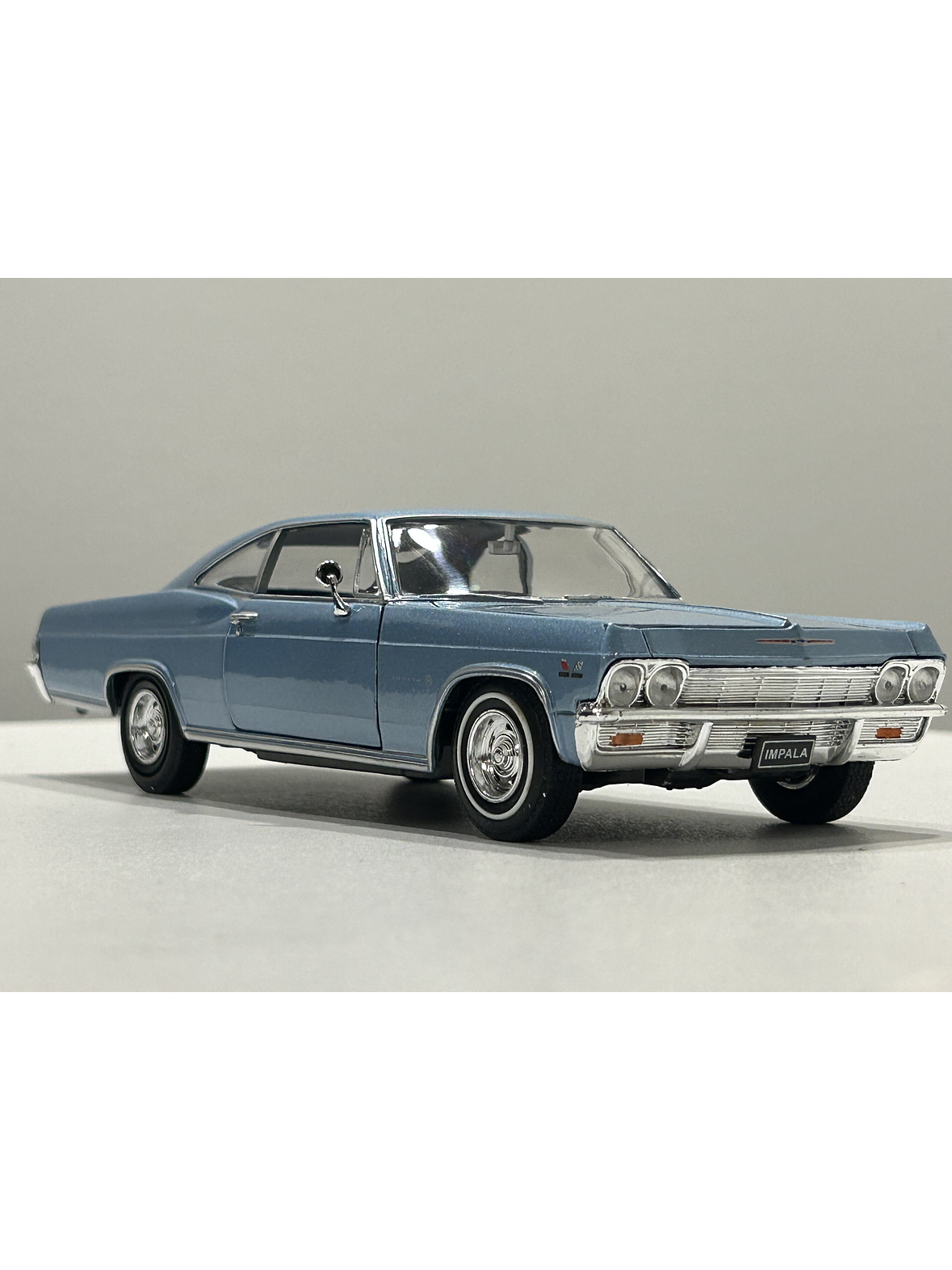 Chevrolet Impala SS 396 1965 – Modelo a Escala 1:24 Welly Diecast Coleccionable 11