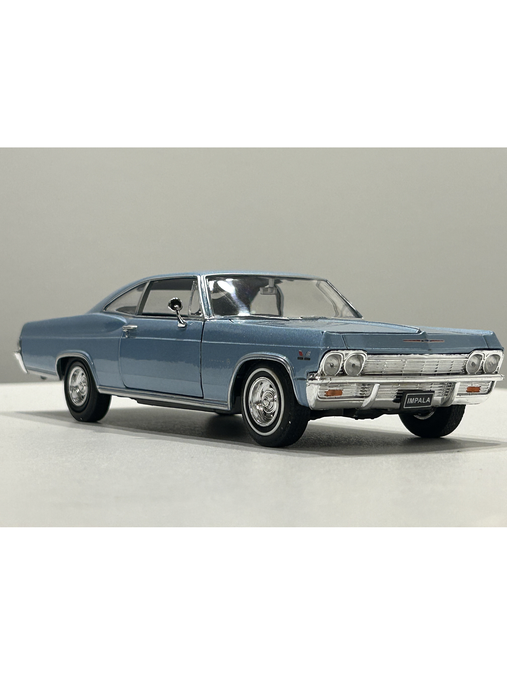 Chevrolet Impala SS 396 1965 – Modelo a Escala 1:24 Welly Diecast Coleccionable 11