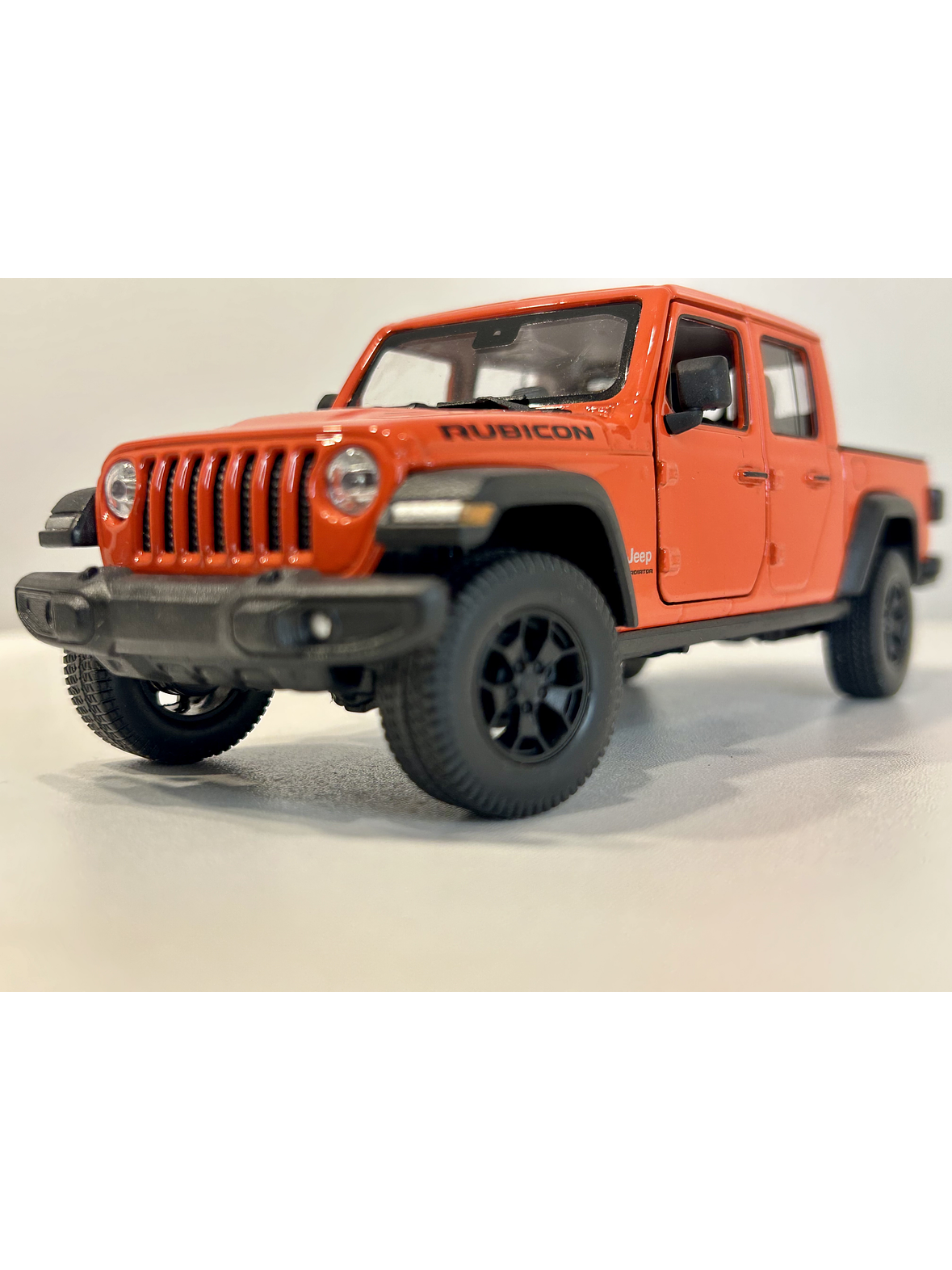 Welly Jeep Gladiator Rubicon 1:24 (naranja “Punk”) – Pick-up 4x4 icónica para coleccionistas en Chile | Ruta Nostalgia 1
