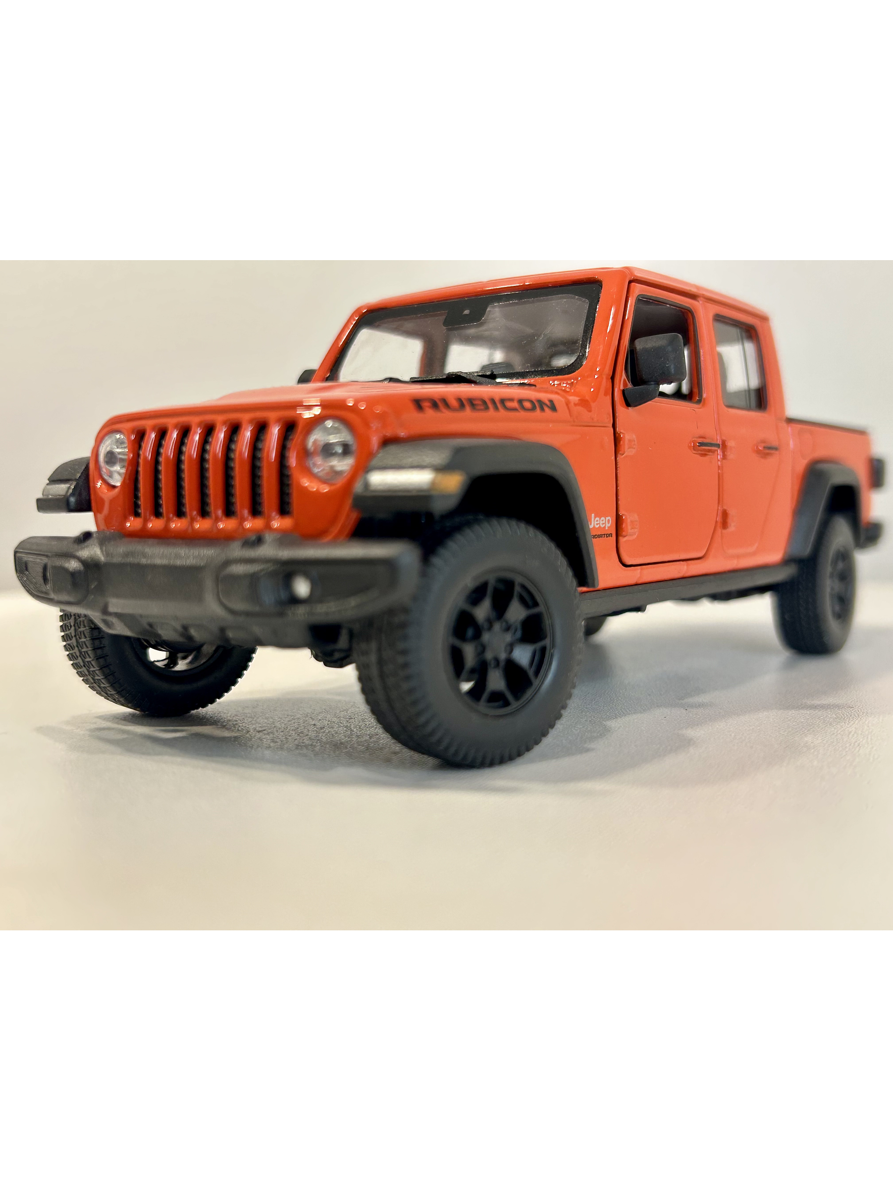 Welly Jeep Gladiator Rubicon 1:24 (naranja “Punk”) – Pick-up 4x4 icónica para coleccionistas en Chile | Ruta Nostalgia 1