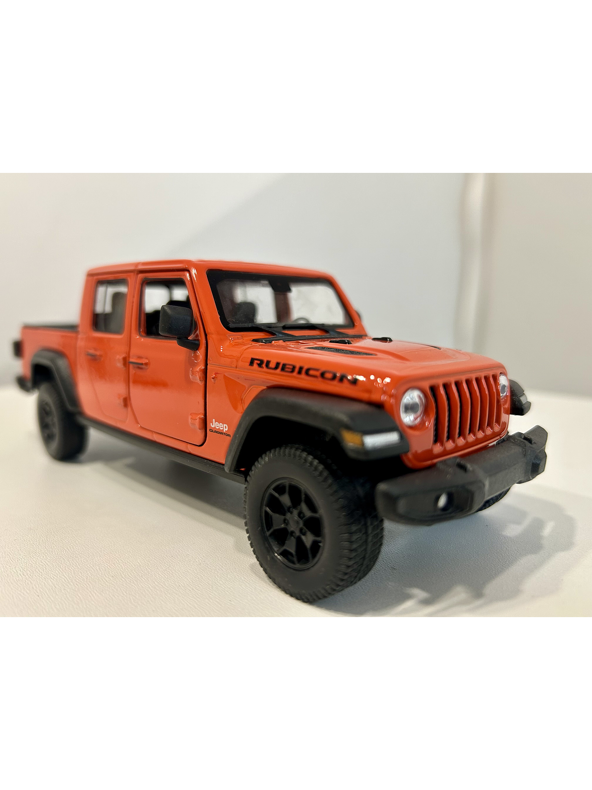 Welly Jeep Gladiator Rubicon 1:24 (naranja “Punk”) – Pick-up 4x4 icónica para coleccionistas en Chile | Ruta Nostalgia 3
