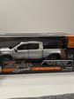 Motormax GMC Sierra 1500 SLT Crew Cab 2019 1:24 – Poder y Nostalgia en Miniatura - Miniatura 11