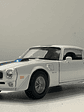 Welly Pontiac Firebird Trans Am 1972 1:24 (blanco/azul) – Ícono “muscle” en miniatura para coleccionistas en Chile - Miniatura 1