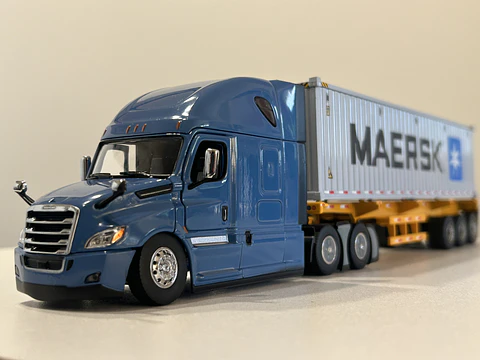 Freightliner Cascadia con tráiler esqueletal y contenedor 40’ MAERSK – Diecast Masters 1:50 - AUSENTE ESPEJO RETROVISOR DELANTERO IZQUIERDO