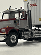 Western Star 4900 SF Day Cab con tráiler esqueletal y contenedor 40’ – Diecast Masters 1:50 (71064) - thumbnail 12