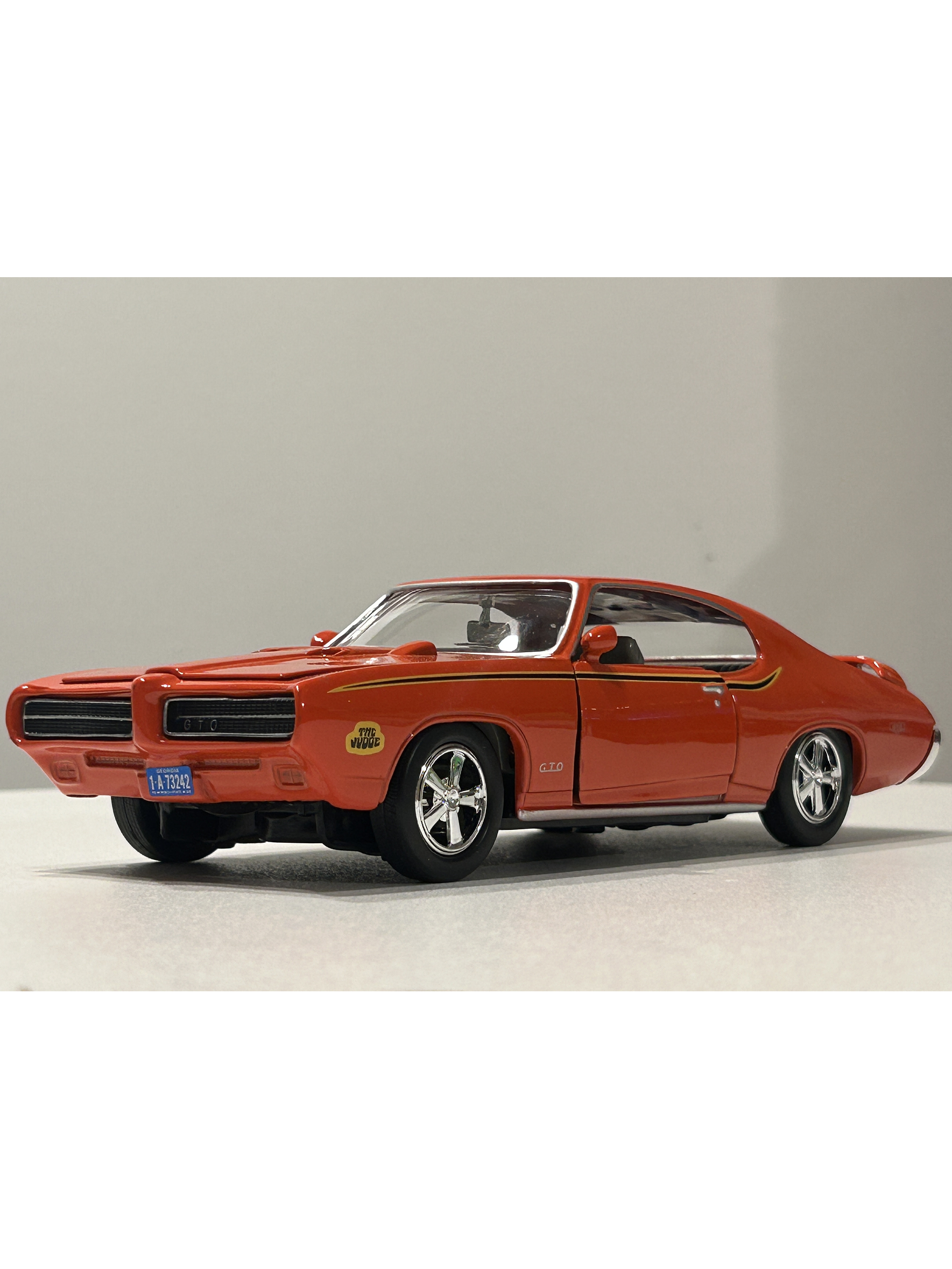 Pontiac GTO Judge 1969 naranja 1:24 Motormax – Muscle car clásico americano de colección  1