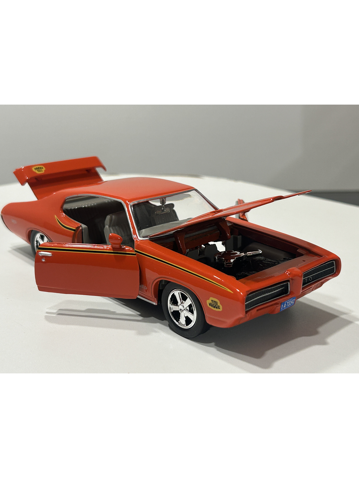 Pontiac GTO Judge 1969 naranja 1:24 Motormax – Muscle car clásico americano de colección  2
