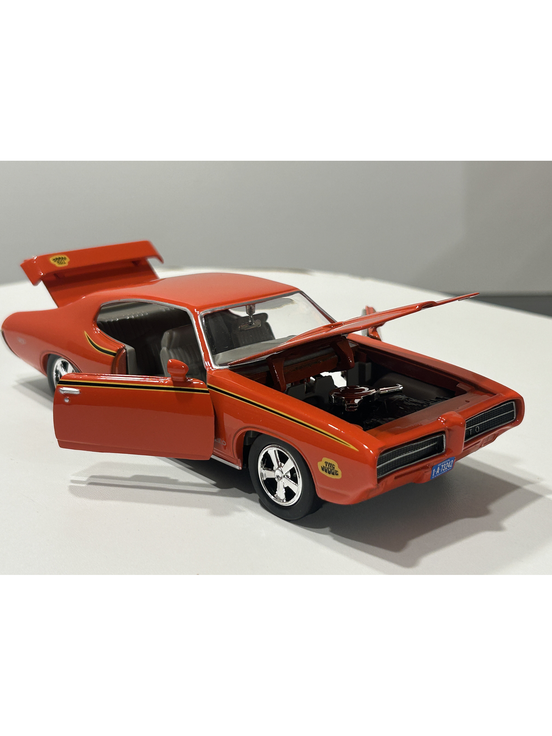 Pontiac GTO Judge 1969 naranja 1:24 Motormax – Muscle car clásico americano de colección  2