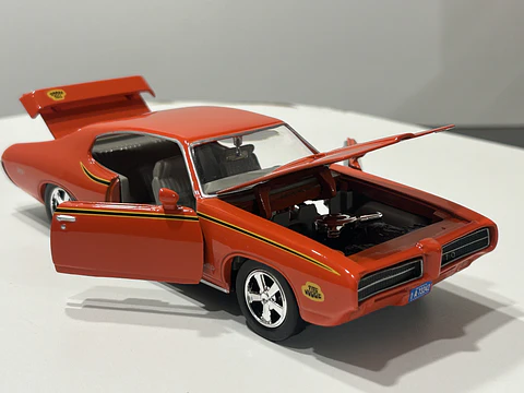 Auto Pontiac GTO Judge 1969 naranja | Motormax 1:24